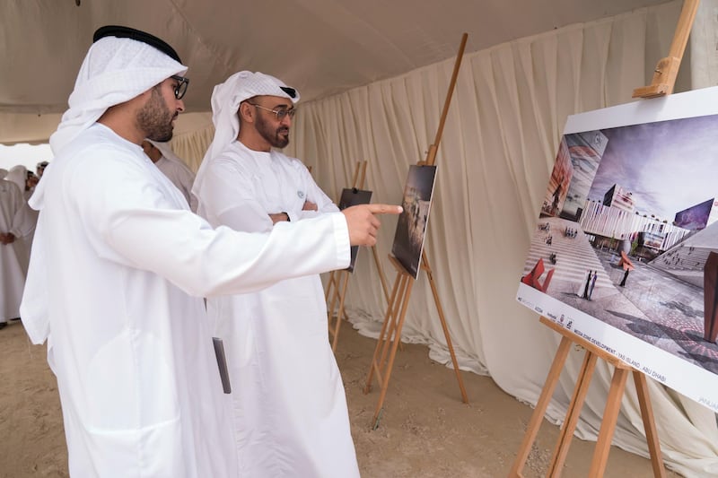 YAS ISLAND, ABU DHABI, UNITED ARAB EMIRATES - March 01, 2018: HH Sheikh Mohamed bin Zayed Al Nahyan, Crown Prince of Abu Dhabi and Deputy Supreme Commander of the UAE Armed Forces (2nd L), inspects urban development and tourism projects, at Yas Bay. Seen with HE Mohamed Khalifa Al Mubarak, Chairman of the Department of Culture and Tourism and Abu Dhabi Executive Council Member (L).

( Mohamed Al Hammadi / Crown Prince Court - Abu Dhabi )
---