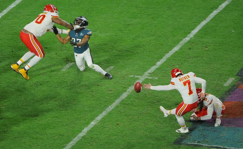 Kansas City Chiefs' Harrison Butker kicks a field goal which results in Kansas City Chiefs winning Super Bowl LVII. Reuters