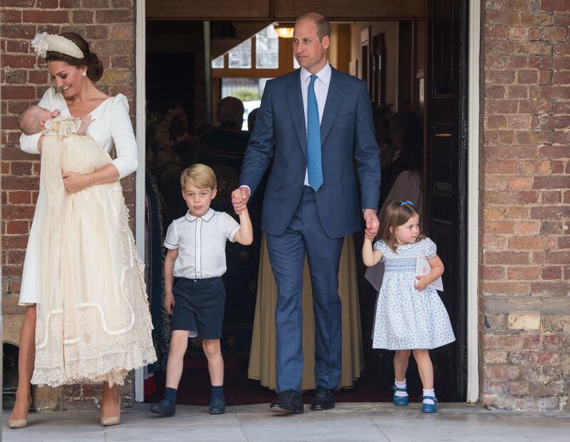 Catherine and Prince William with Prince George, Princess Charlotte and Prince Louis after Louis' christening at St James's Palace, London, in July 2018