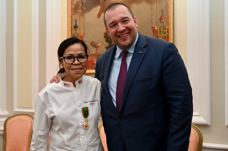 Ms Comerford, the first woman in charge of the White House kitchen, was inducted into France's Order of Agricultural Merit at the rank of officer. AFP