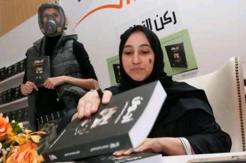 Noura Al Noman at the signing of her science fiction novel Ajwan. Sharjah Book Fair, Sharjah Expo Centre. Duncan Chard for the National.