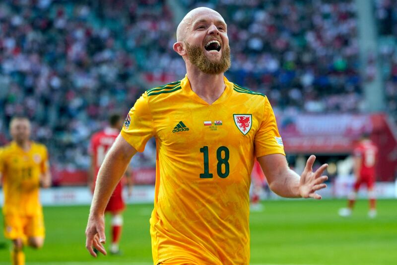 Wales' midfielder Jonathan Williams celebrates scoring the opening goal. AFP