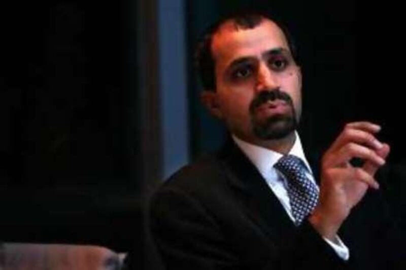 DUBAI-DECEMBER 1,2008 - Nasser Al Shaali, CEO of Dubai International Financial Centre,( DIFC ) gestures during interview at Dubai International Financial Centre in Dubai. ( Paulo Vecina/The National ) *** Local Caption ***  PV NAsser 9.JPG *** Local Caption ***  PV NAsser 9.JPG