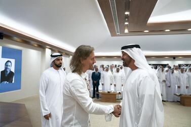 Sheikh Mohamed bin Zayed, Crown Prince of Abu Dhabi and Deputy Supreme Commander of the UAE Armed Forces, greets Dr Beau Lotto at his lecture titled 'The Science of Innovation: Becoming Naturally Adaptable', at the Crown Prince's Majlis. Eissa Al Hammadi / Ministry of Presidential Affairs
