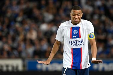 (FILES) Paris Saint-Germain's French forward Kylian Mbappe reacts during the French L1 football match between RC Strasbourg Alsace and Paris Saint-Germain (PSG) at Stade de la Meinau in Strasbourg, eastern France on May 27, 2023.  French superstar Kylian Mbappe was reinstated in Paris Saint-Germain's first team on August 13, 2023 after being sidelined for several weeks amid an ongoing contract dispute.  (Photo by Jean-Christophe Verhaegen  /  AFP)