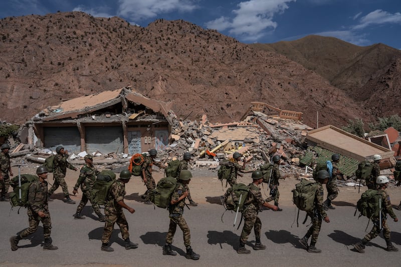Moroccan troops prepare to embark on relief missions in the mountains near Talat N'Yaaqoub. Getty Images