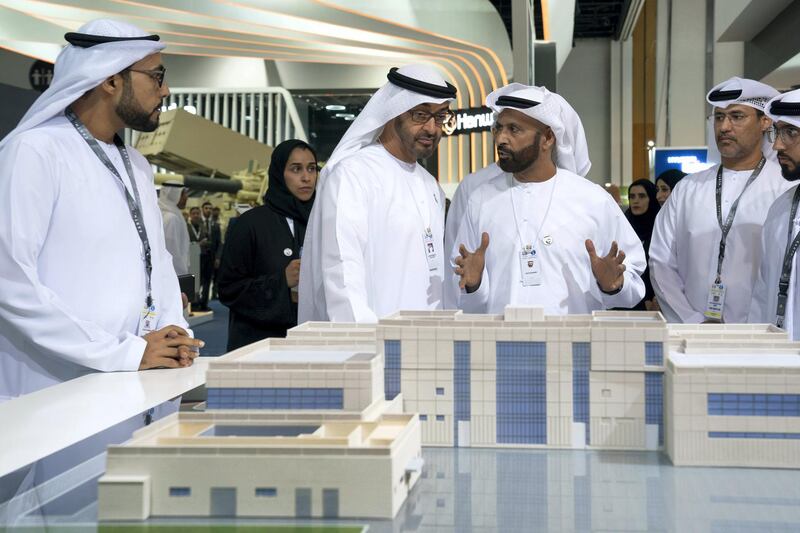 ABU DHABI, UNITED ARAB EMIRATES - February 21, 2019: HH Sheikh Mohamed bin Zayed Al Nahyan, Crown Prince of Abu Dhabi and Deputy Supreme Commander of the UAE Armed Forces (4th R), visits Earth stand, during the 2019 International Defence Exhibition and Conference (IDEX), at Abu Dhabi National Exhibition Centre (ADNEC). 

( Ryan Carter for the Ministry of Presidential Affairs )
---