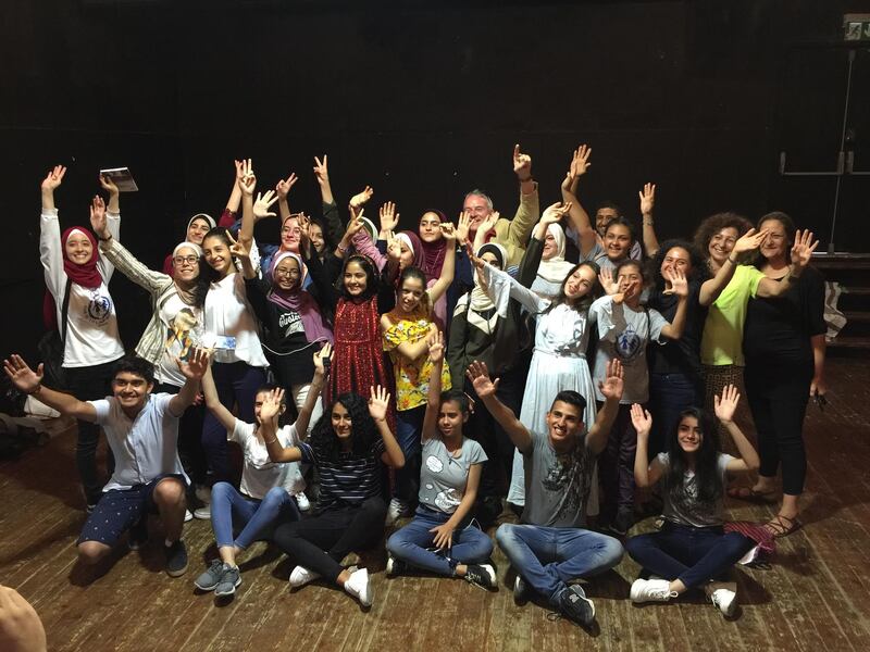 Children from Gaza celebrate after performing a play they wrote at the Palestinian National Theatre in Jerusalem. Nick Bilborough