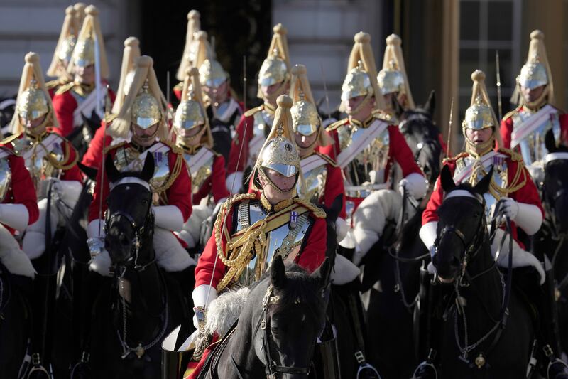 Soldiers attend the State Opening of Parliament. AP