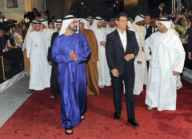DUBAI, UNITED ARAB EMIRATES - DECEMBER 07:  His Highness Sheikh Mohammed Bin Rashid Al Maktoum and actor Tom Cruise attend the "Mission: Impossible - Ghost Protocol" Premiere during day one of the 8th Annual Dubai International Film Festival held at the Madinat Jumeriah Complex on December 7, 2011 in Dubai, United Arab Emirates.  (Photo by Andrew H. Walker/Getty Images for DIFF)