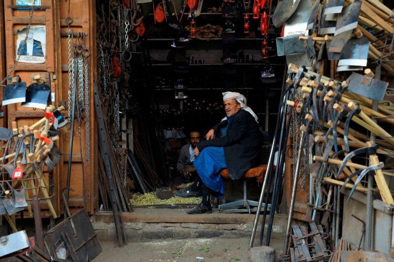 A vendor waits for customers at a market in Sana'a's old quarter in Yemen. AFP