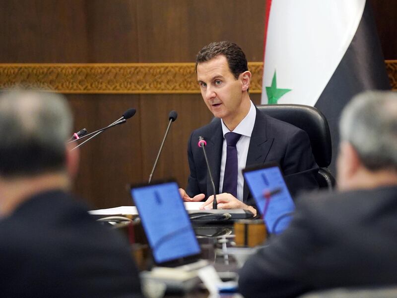 epa07570019 A handout photo made available by the official Syrian Arab News Agency (SANA) shows Syrian President Bashar Assad chairing a cabinet meeting in Damascus, Syria, 14 May 2019.  EPA/SANA HANDOUT  HANDOUT EDITORIAL USE ONLY/NO SALES