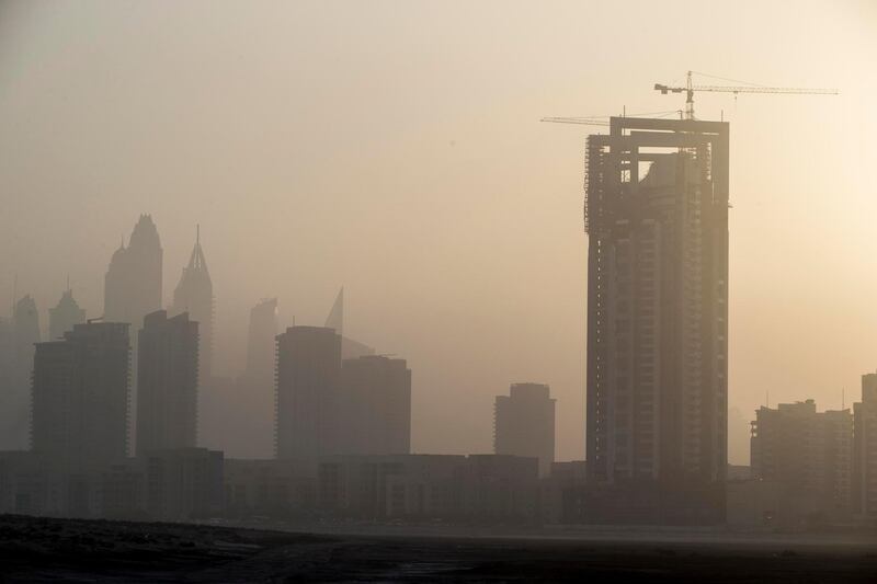 DUBAI, UNITED ARAB EMIRATES, 10 MAY 2017. Standalone photo. As summer temperatures rise visibility drops in the UAE as seen in the dusty sunset over Al Barsha Heights and the Greens. Today saw a heat index of 41 degrees with humidity of 60% while visibility was limited to 4km's. (Photo: Antonie Robertson/The National) ID: STANDALONE. Journalist: None. Section: National. *** Local Caption ***  AR_1005_Standalone_Weather-03.JPG