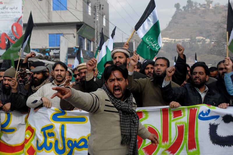 Hizbul Mujahideen supporters chant slogans during a protest in Muzaffarabad, the capital of Pakistani-administered Kashmir. Kashmir is among a number of disputed areas that have been subject to tensions since India and Pakistan declared independence. AFP / Sajjad Qayyum

