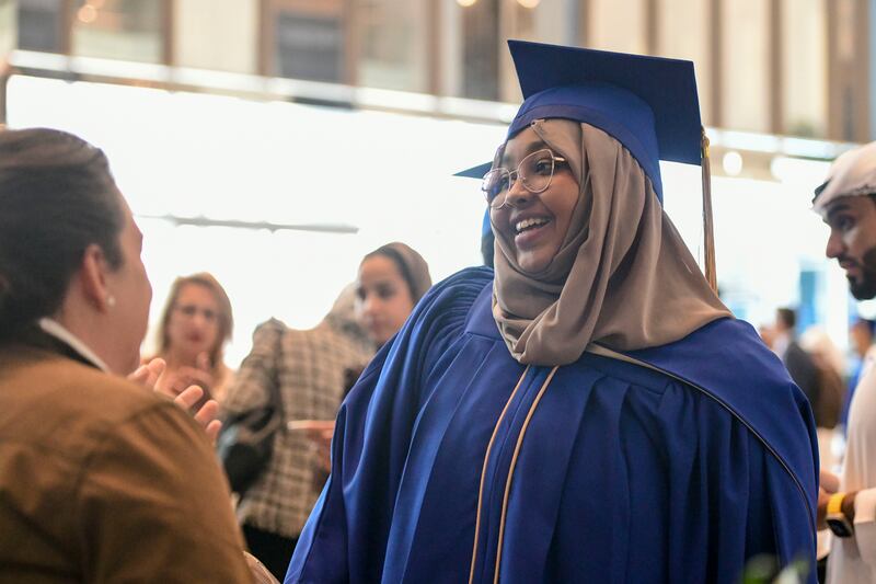 Sarah Abdulla, 28, celebrates her graduation from the university's first class. Two thirds of students have already secured jobs, paid placements, or places on courses for further study.