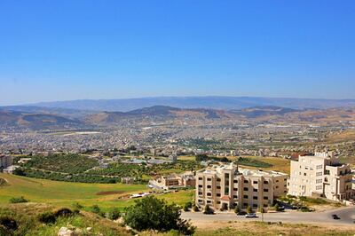 The view of the camp from a hill in the north west of Amman. Charlie Faulkner