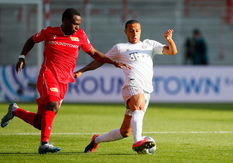 Union Berlin's Anthony Ujah in action with Bayern Munich's Thiago. EPA