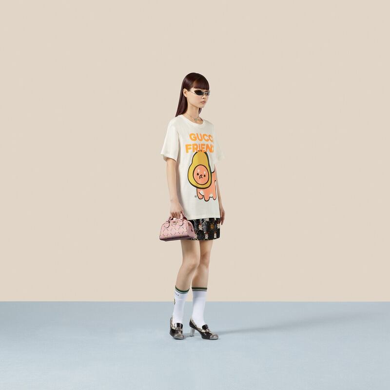 Graphic T-shirts: Gucci Friends tee, Dh2,300, Gucci