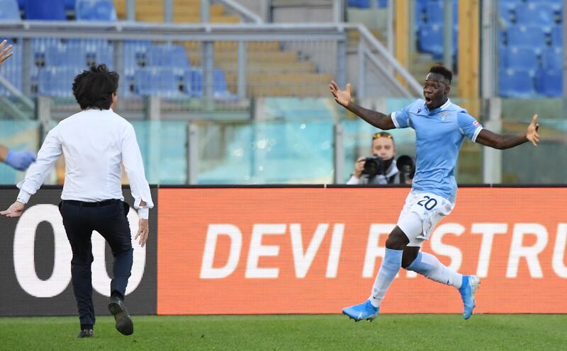 Lazio’s Felipe Caicedo celebrates scoring their late leveller with manager Simone Inzaghi. Reuters