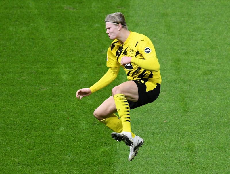 Erling Braut Haaland celebrates scoring Dortmund's final goal in their 5-2 win at Hertha Berlin. Reuters