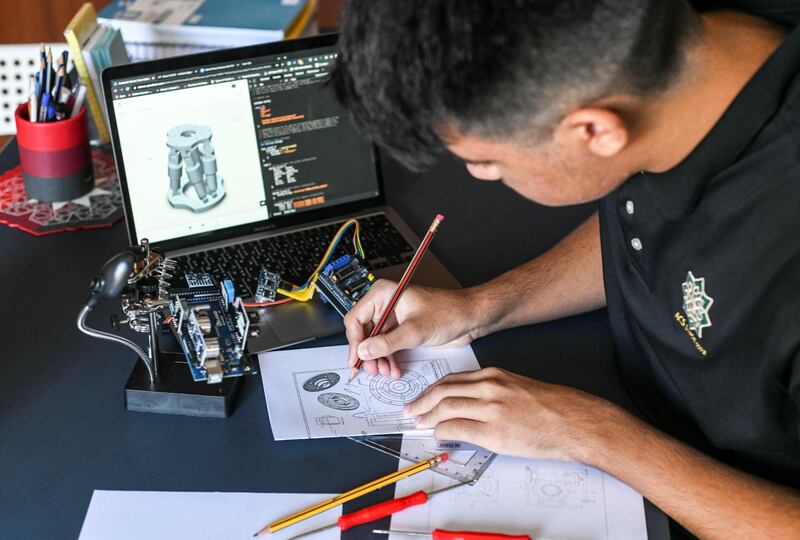 Abu Dhabi, United Arab Emirates - Mohamed Yalouh, 15, integrating the final CAD model of the ground based units. Khushnum Bhandari for The National