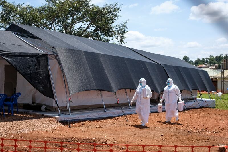 Doctors at the Ebola isolation section of Mubende Regional Referral Hospital. AP