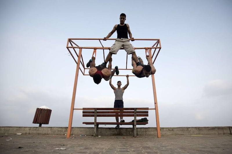 Bar Palestine members work out outside as all of Gaza City’s gyms were destroyed in last summer’s war.