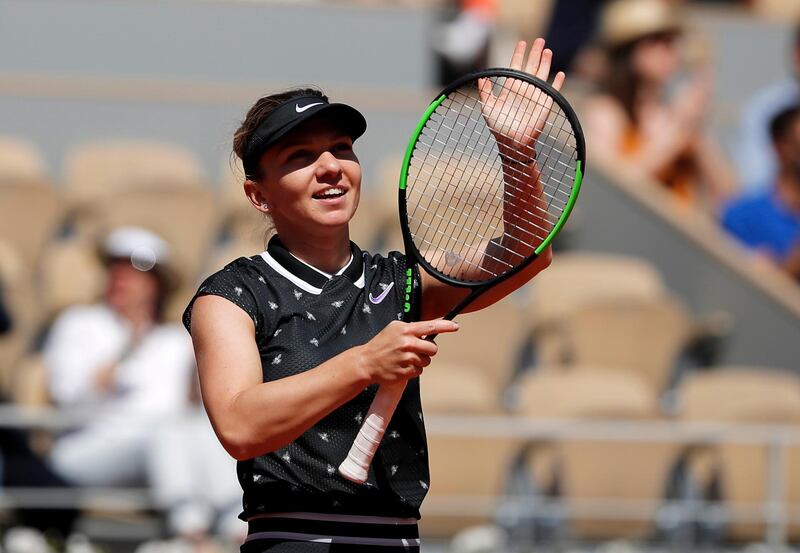 Tennis - French Open - Roland Garros, Paris, France - June 1, 2019. Romania's Simona Halep greets the crowd after winning her third round match against Ukraine's Lesia Tsurenko. REUTERS/Gonzalo Fuentes