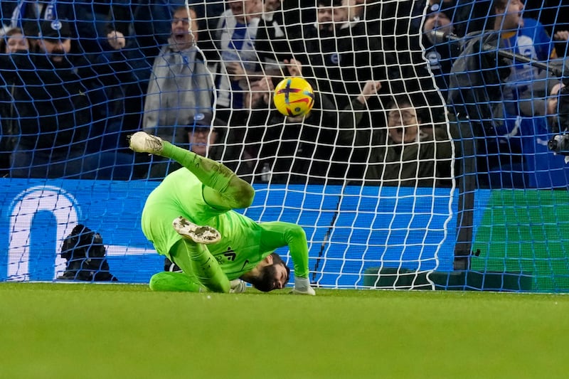 Liverpool goalkeeper Alisson is beaten for Solly March's first goal. AP