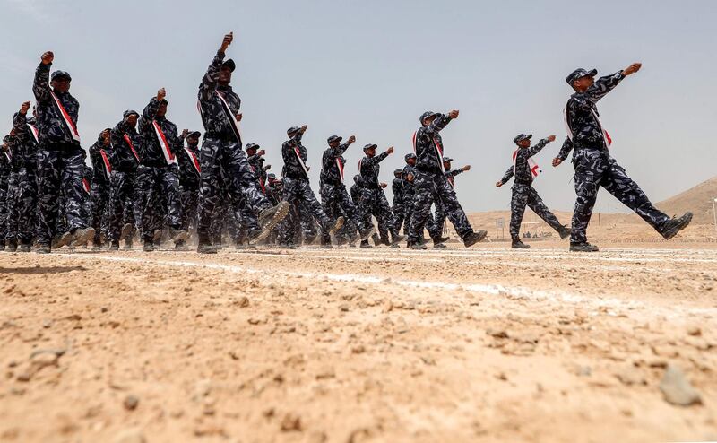 UAE-trained cadets of the Yemeni police, supporting forces loyal to the Saudi and UAE-backed government, marching during their graduation in  Mukalla. AFP