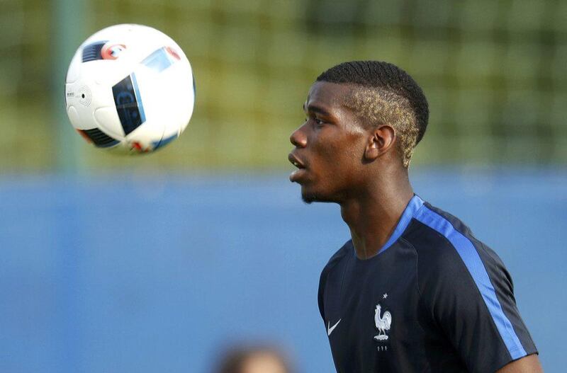 Paul Pogba's mother, Yeo Moriba, credits herself for his ever-changing hairstyles. Charles Platiau / Reuters