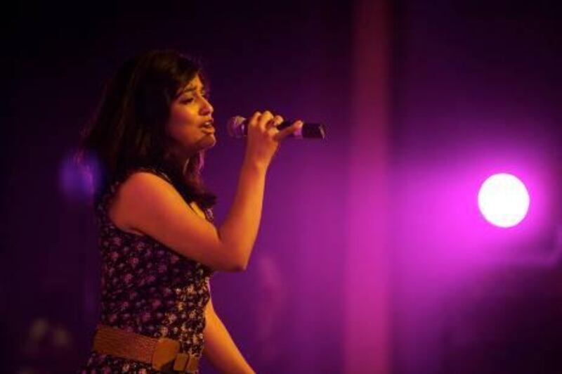 DUBAI, UNITED ARAB EMIRATES Ð April 13,2011: Malvika performing in the AUD Idol finale at American University of Dubai in Dubai.  (Pawan Singh / The National) For News. Story by Melanie