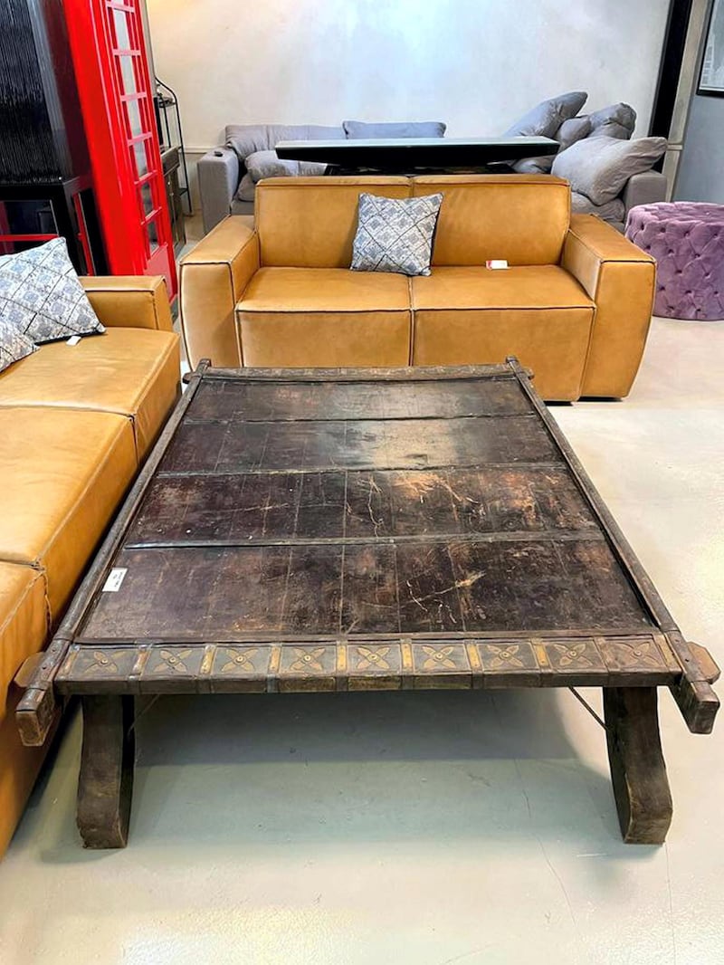 An elephant saddle that has been converted into a coffee table, Dh850, at La Brocante.