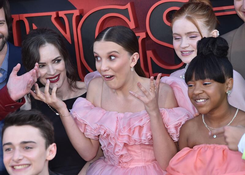 Left to right: US actress Winona Ryder, Millie Bobby Brown, US actress Sadie Sink and US actress Priah Ferguson attend Netflix's 'Stranger Things 3' premiere.  AFP