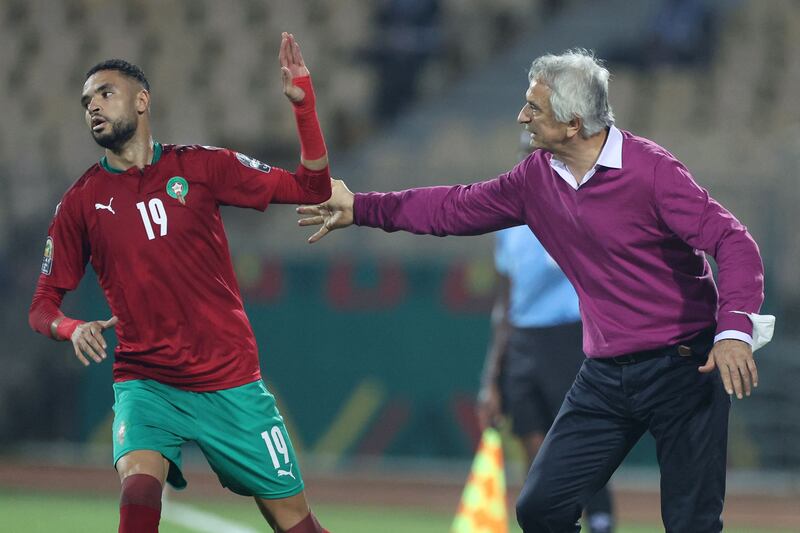 Morocco's Bosnian head coach Vahid Halilhodzic chats with Morocco's forward Youssef En-Nesyri. AFP