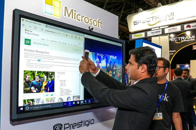 Above, the Microsoft stand which showcases face recognition software. Victor Besa for The NationalBusiness