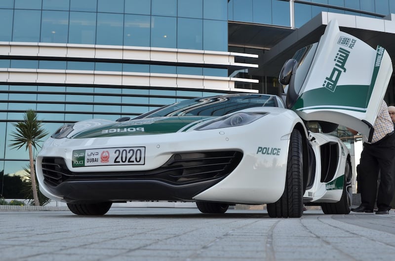 Dubai Police take receipt of a McLaren MP4-12C .

Courtesy Dubai Police *** Local Caption ***  NMN_1154.JPG