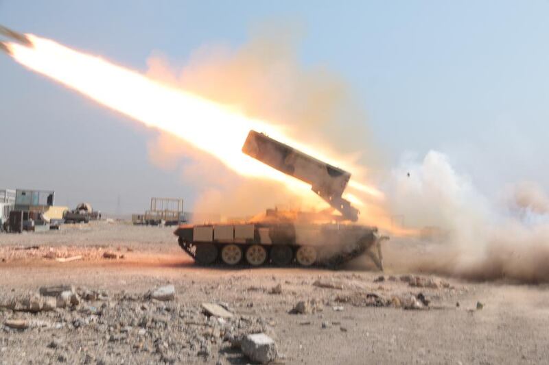 Iraqi forces fighting to retake Mosul airport from ISIS fire a missile from a rocket launcher on February 23, 2017. Florian Neuhof / The National