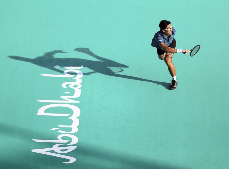 Abu Dhabi, United Arab Emirates - Reporter: Jon Turner: Hyeon Chung hits a shot during the fifth place play-off between Andrey Rublev v Hyeon Chung at the Mubadala World Tennis Championship. Friday, December 20th, 2019. Zayed Sports City, Abu Dhabi. Chris Whiteoak / The National