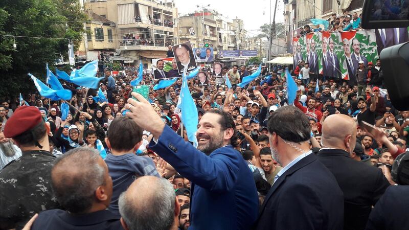Lebanon's Prime Minister Saad al Hariri takes selfies during an election campaign in Tripoli, Lebanon April 27,2018. Dalati Nohra/Handout via REUTERS THIS IMAGE HAS BEEN SUPPLIED BY A THIRD PARTY.