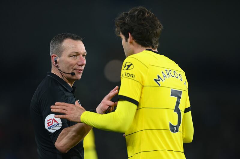Referee Kevin Friend speaks to Marcos Alonso of Chelsea. Getty Images