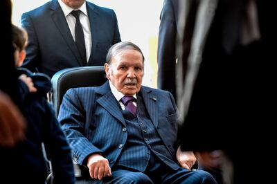 (FILES) In this file photo taken on November 23, 2017, Algerian President Abdelaziz Bouteflika is seen while voting at a polling station in the capital Algiers during polls for local elections.  Algeria's President Abdelaziz Bouteflika announced on March 11, 2019 his withdrawal from a bid to win another term in office and postponed an April 18 election, following weeks of protests against his candidacy. Bouteflika, in a message carried by national news agency APS, said the presidential poll would follow a national conference on political and constitutional reform to be drawn up by the end of 2019. / AFP / RYAD KRAMDI
