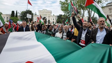 Protesters march in solidarity with the Palestinian people, in Istanbul, Turkey. EPA