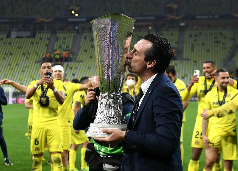 Villarreal manager Unai Emery kisses the trophy after the Europa League final. PA