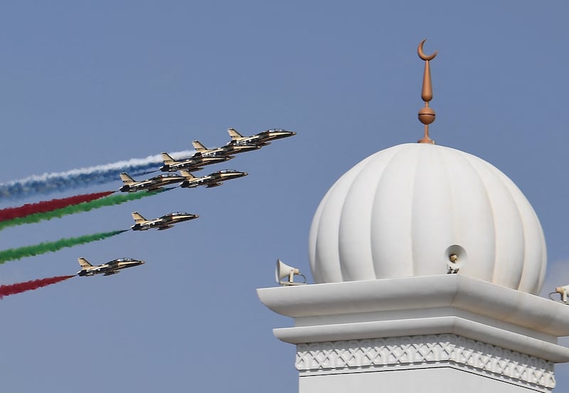 The UAE's Air Force Aerobatic Team, Al-Fursan, performs stunts at the Dubai Airshow in 2019. Karim Sahib / AFP