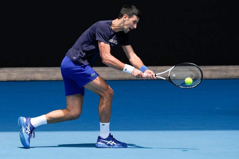 Serbia's Novak Djokovic practices on Rod Laver Arena.  AP Photo