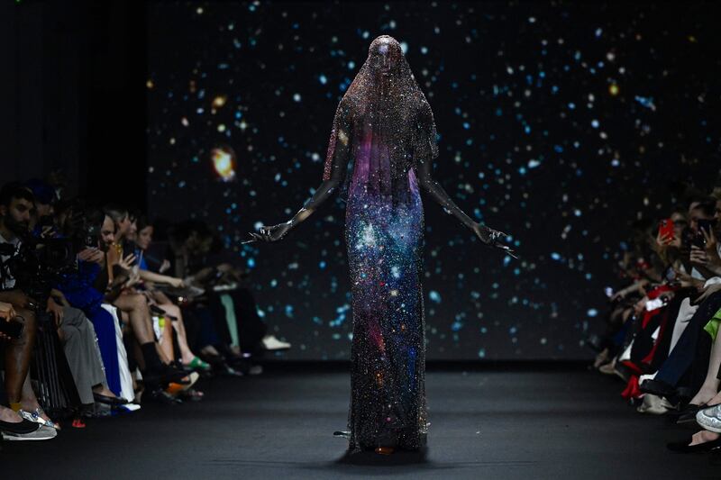 A model presents a creation by Robert Wun during the Haute-Couture Autumn/Winter show as part of Paris Fashion Week. AFP