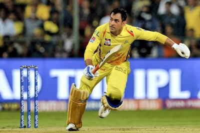 EDITORS NOTE: Graphic content / Chennai Super Kings captain and batsman M.S. Dhoni runs between the wickets during the 2019 Indian Premier League (IPL) Twenty20 cricket match between Royal Challengers Bangalore and Chennai Super Kings at The M. Chinnaswamy Stadium in Bangalore on April 21, 2019. (Photo by Manjunath KIRAN / AFP) / IMAGE RESTRICTED TO EDITORIAL USE - STRICTLY NO COMMERCIAL USE