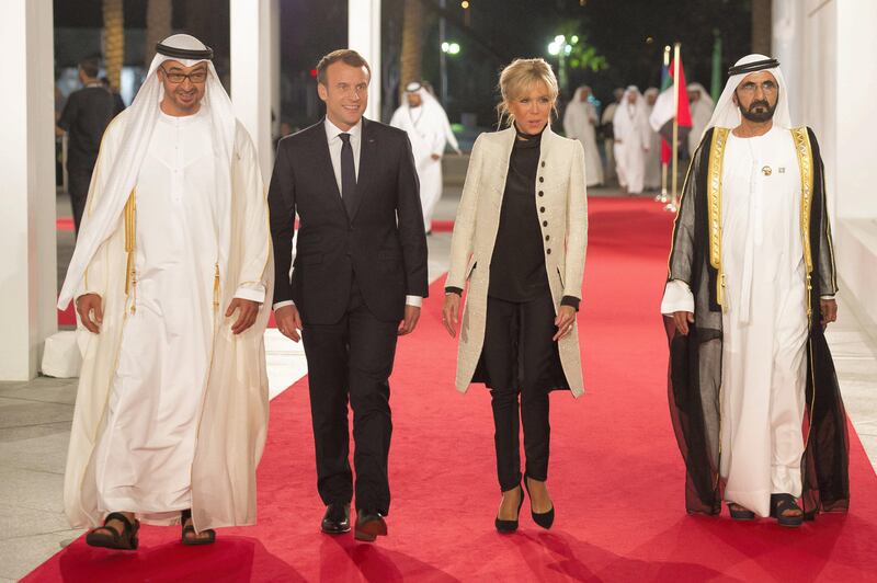 SAADIYAT ISLAND, ABU DHABI, UNITED ARAB EMIRATES -November 08, 2017: HH Sheikh Mohamed bin Zayed Al Nahyan Crown Prince of Abu Dhabi Deputy Supreme Commander of the UAE Armed Forces (L), HE Emmanuel Macron, President of France (2nd L), Brigitte Macron (3rd L) and HH Sheikh Mohamed bin Rashid Al Maktoum, Vice-President, Prime Minister of the UAE, Ruler of Dubai and Minister of Defence (R), arrive for the opening ceremony of the Louvre Abu Dhabi.

( Omar Al Askar  for The Crown Prince Court - Abu Dhabi )
---