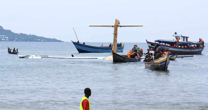 A witness said he saw the plane flying unsteadily as it approached the airport in poor visibility conditions, saying it took a turn for the airport but then veered into the lake. EPA